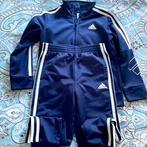 Boys Adidas track suit. Navy. Great condition. Size 5